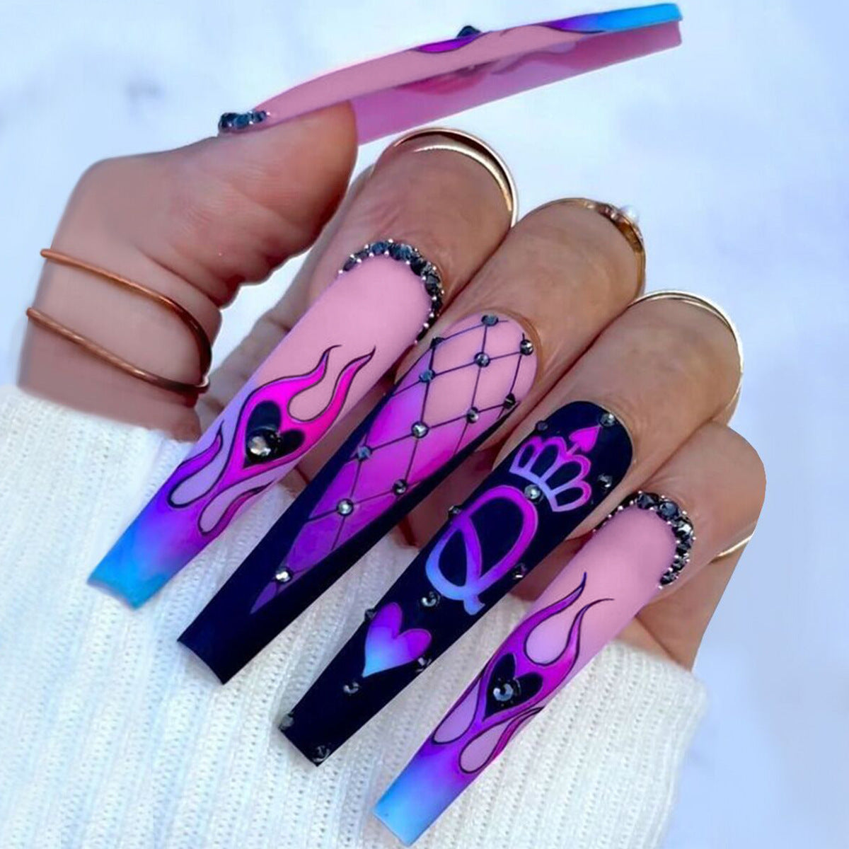 Intricate Pink Nails with Flame & Heart Accents