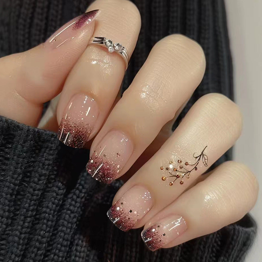 Sophisticated Ombre Nails with Gold Shimmer