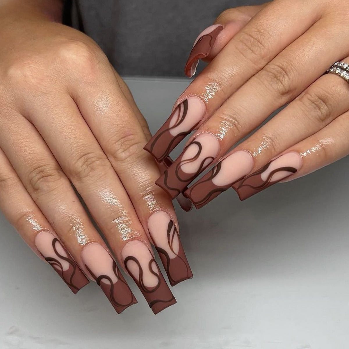 Choc-Loving Elegant Long Nails with Swirls