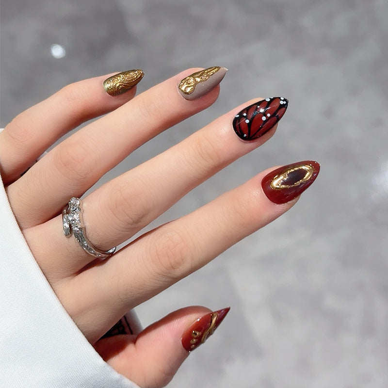Maroon Leaf Elegance Nails