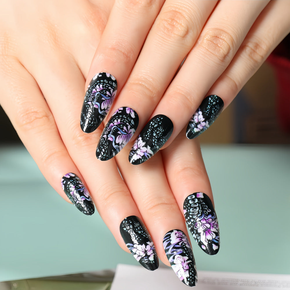 Black Floral Motif Nails That Bloom with Charm