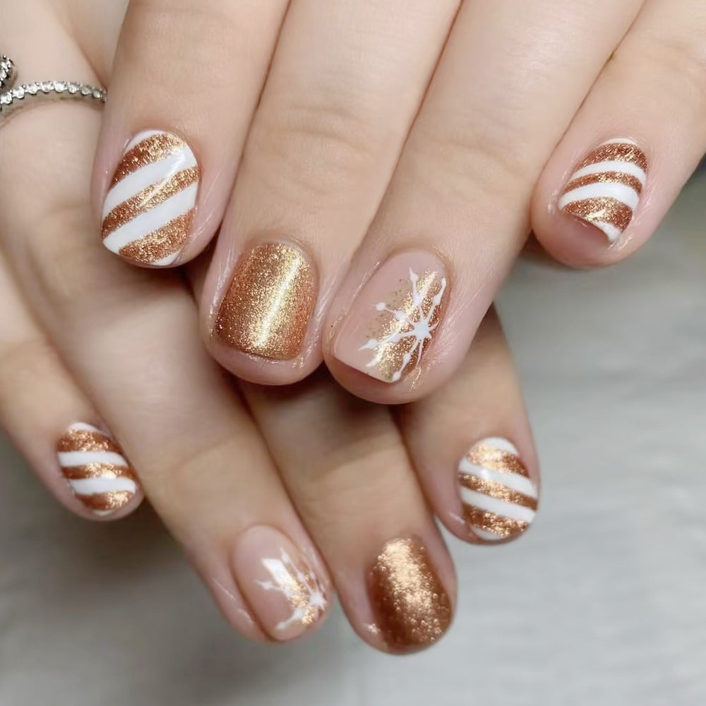 Stunning Rose Gold Nails with Snowflakes