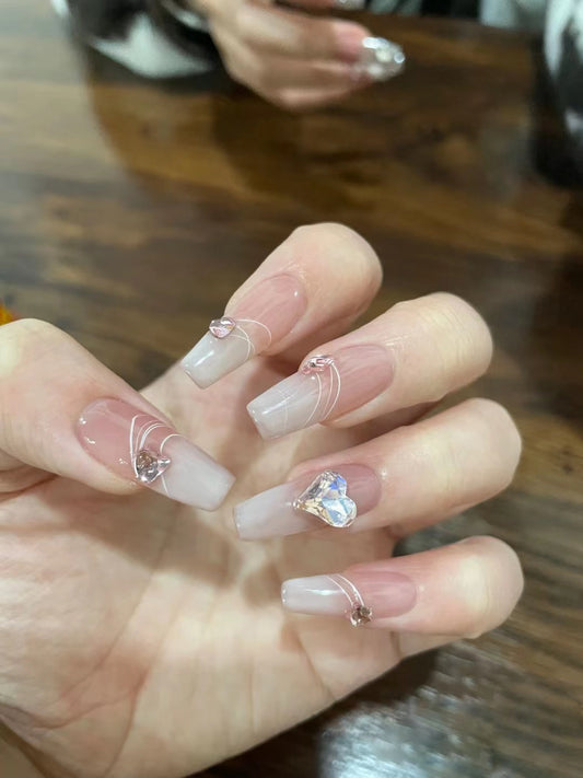 Enchanted Elegance Extra-Long Coffin Clear False Nails with Pink Undertones and Gem Accents Press On Nail Set