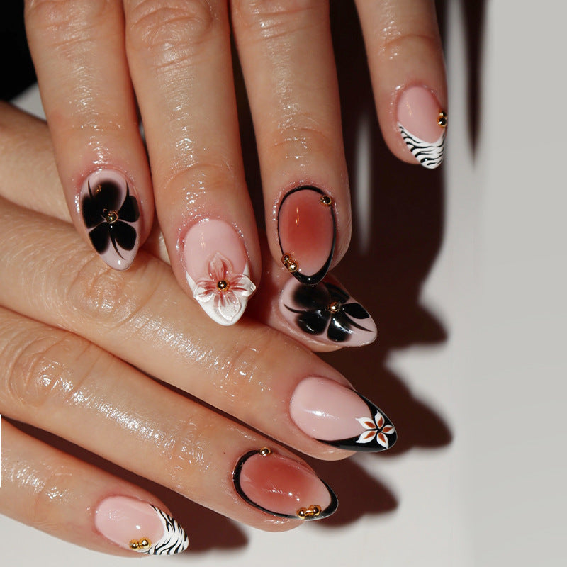 Floral Elegance Long Almond Pink and Black Press-On Nail Set with Artistic Flower Accents