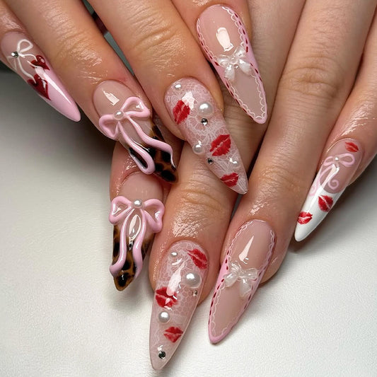 Romantic Bowknot Glamour Long Stiletto Pink Kiss Print Nail Set with Elegant Pearls and Rhinestone Accents