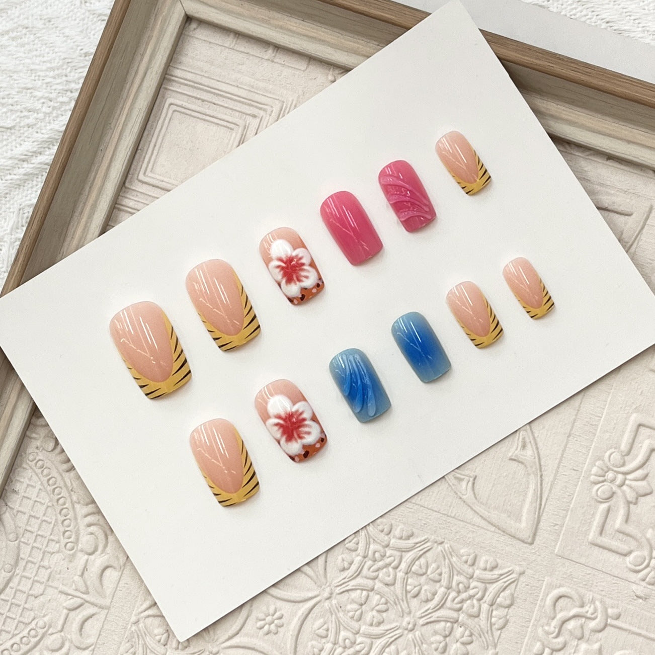 Tropical Paradise Medium Square Pink and Blue Press-On Nail Set with Floral and Striped Design