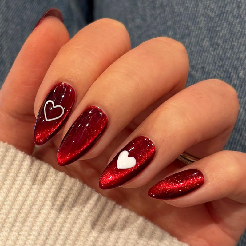 Romantic Elegance Long Almond Shaped Glossy Red Press-On Nail Set with Unique Heart Nail Art