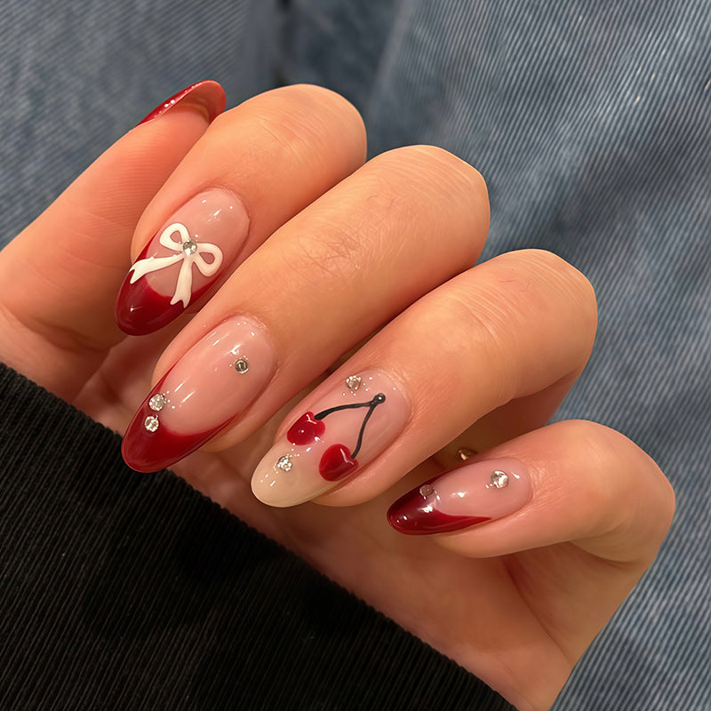 Sweet Cherry Charm Long Almond Burgundy Press On Nail Set with Bow and Gemstone Accents