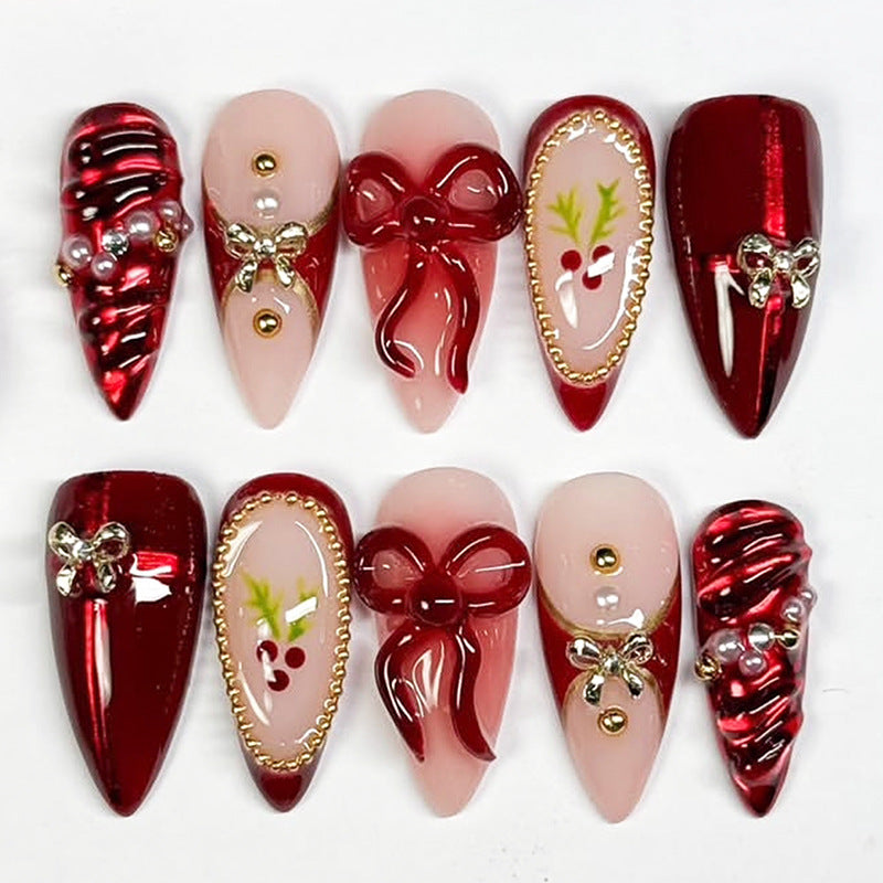 Festive Charm Long Almond Red Press on Nail Set with Glitzy Bows and Pearl Accents