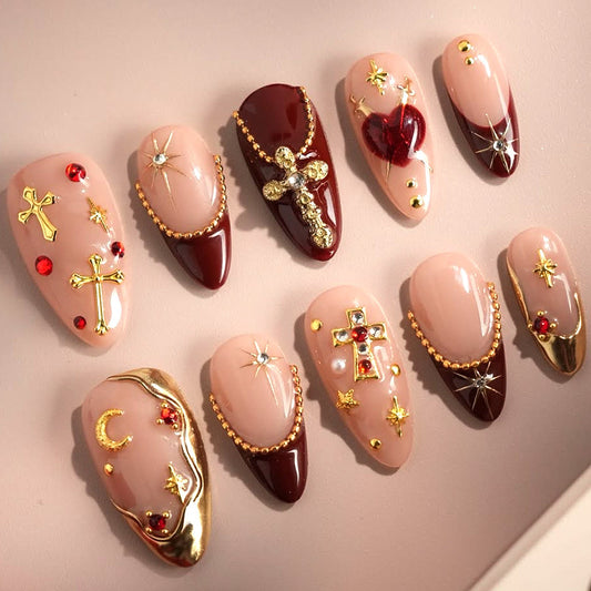 Gothic Elegance Long Almond and Stiletto Shaped Burgundy and Beige Press On Nail Set with Gold Detailing and Decorative Accents
