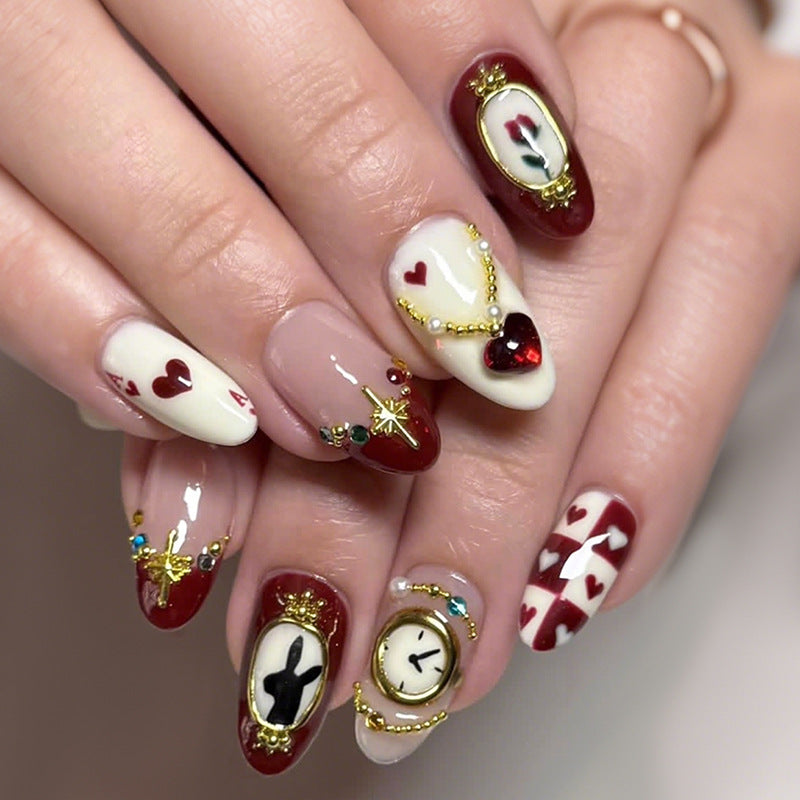 Romantic Whimsy Medium Almond Burgundy and Cream Press On Nail Set with Gold Accents and Heart Designs