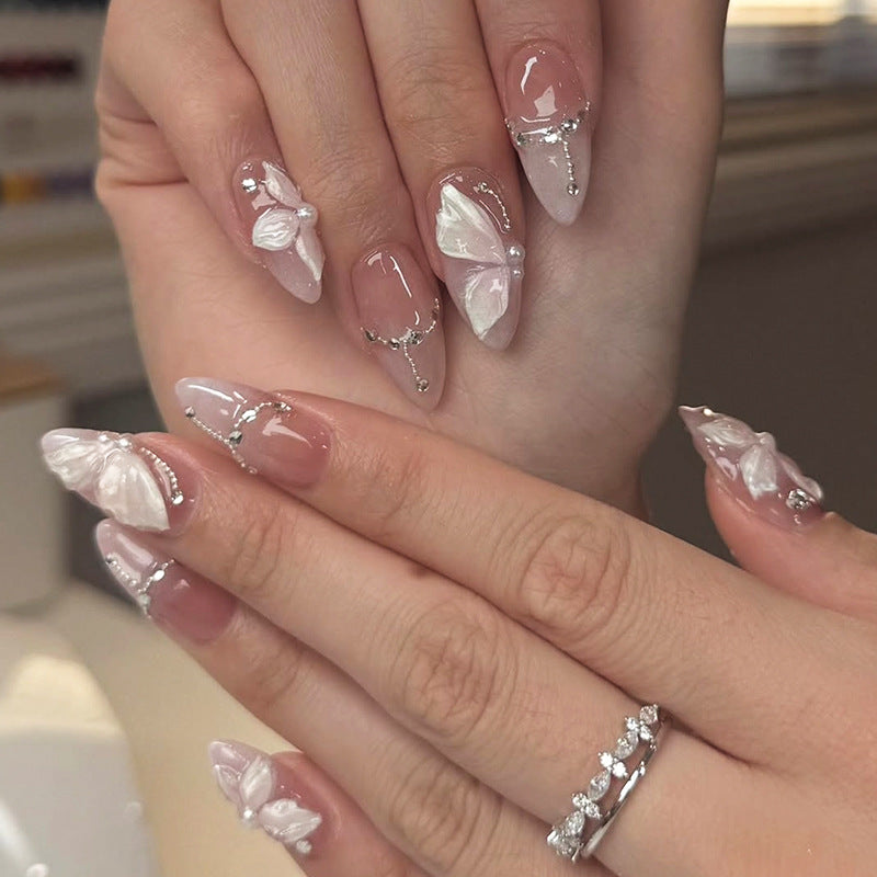 Whimsical Butterfly Elegance Long Almond Soft Pink with Delicate Floral and Pearl Accents Press On Nail Set