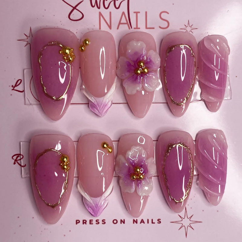 Blooming Elegance Long Almond Pink Colored Press on Nail Set with Floral Accents and Gold Detailing