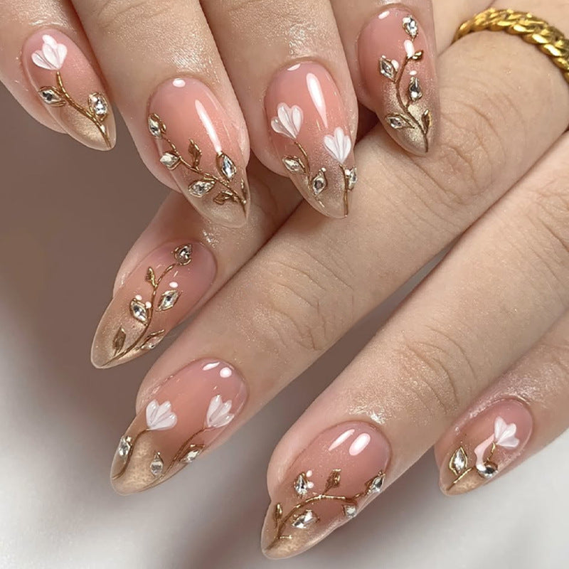 Whimsical Floral Design Elegant Long Almond Shaped Blush Pink Press On Nail Set with Exquisite Gold and Gemstone Accents