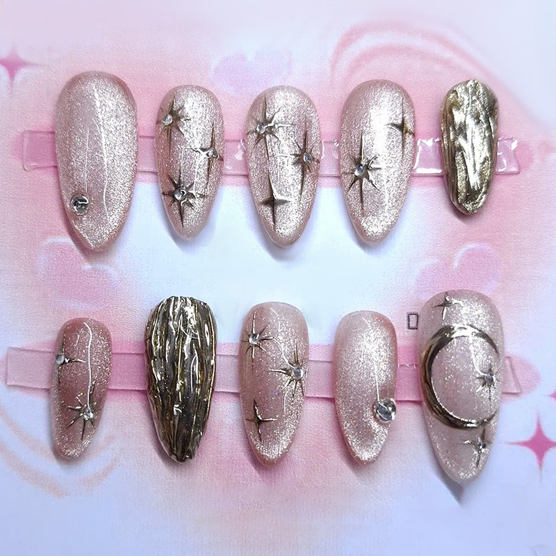 Celestial Dream Pink Long Almond Press On Nail Set with Glittery Star Accents and Unique Metallic Detailing