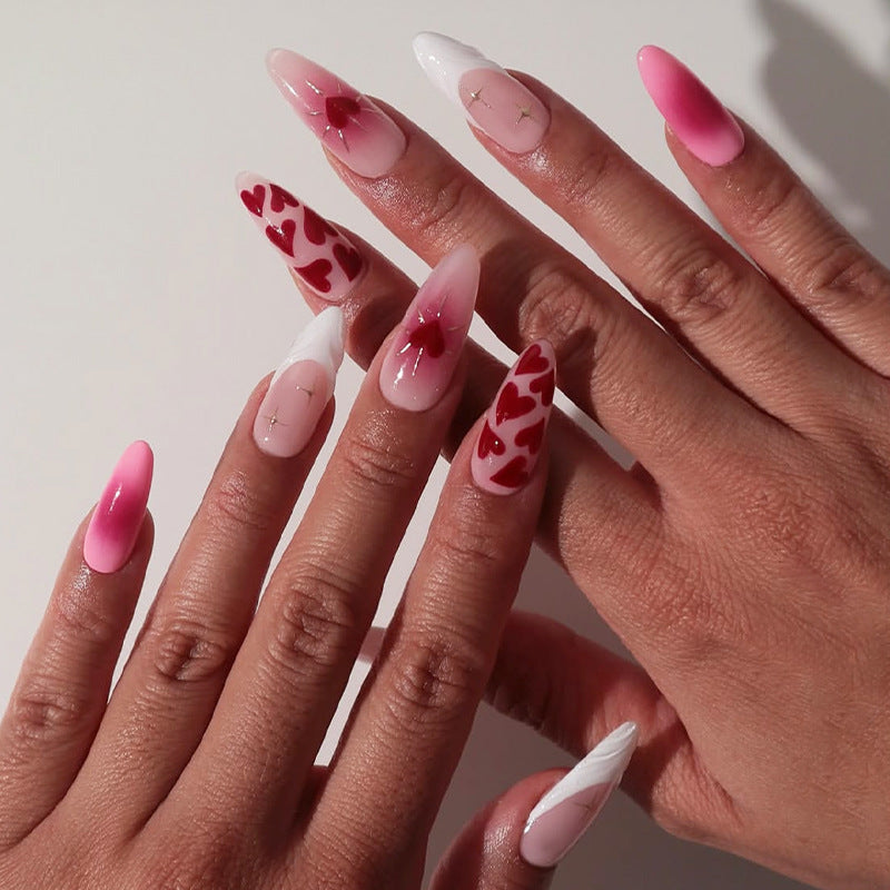 Romantic Bliss Long Almond Pink and White Nails with Heart Designs and Sparkling Accents