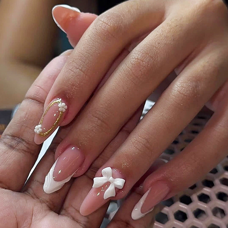 Whimsical Elegance Long Almond Pink and White Press On Nail Set with Decorative Bows and Floral Accents