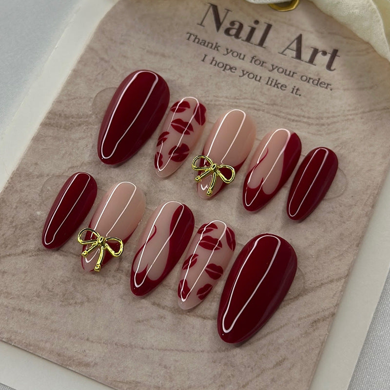 Charming Romance Long Almond Burgundy Press On Nail Set with Bow and Lip Print Design
