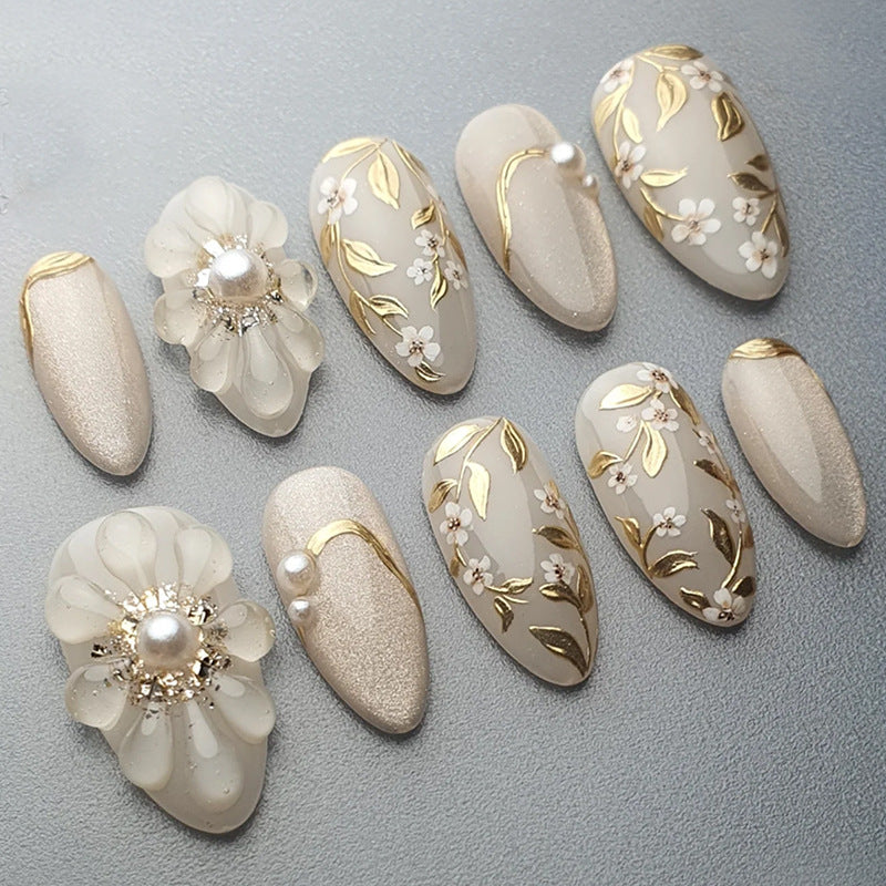 Elegant Garden Inspired Medium Almond Shape Ivory Press-On Nail Set with Floral Accents and Gold Detailing