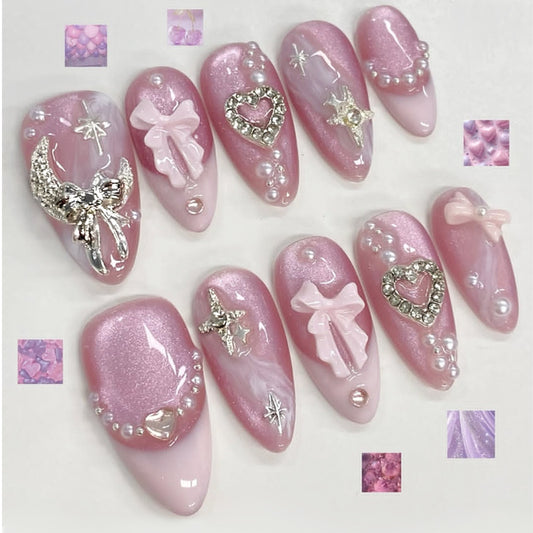 Charming Fairytale Medium Stiletto Pink Nails with Sparkling Embellishments