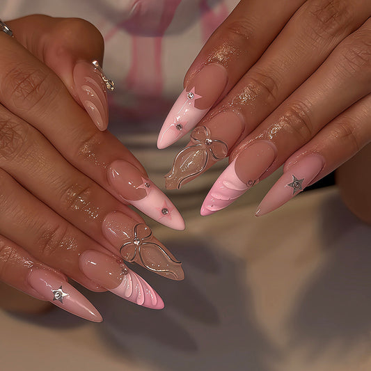 Chic Romance Long Almond Pink Nails with Charming Bow and Star Accents