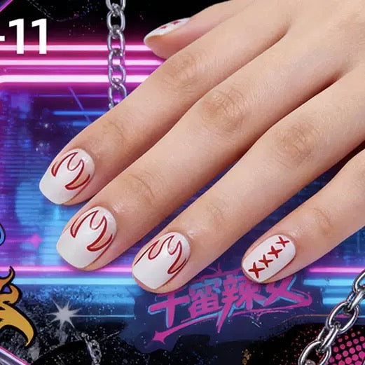 Fierce Flame Inspired Short Square White Press On Nail Set with Bold Red Accents and Unique Stitch Design