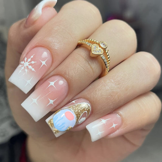 Winter Wonderland Short Square Press On Nails in Long Length with Gradient Frosted White Color Featuring Sparkling Snowflake and Glitter Accents