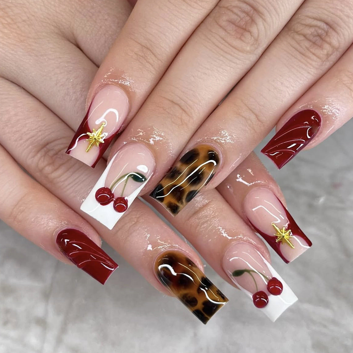 Cherry Blossom Glamour Long Square Burgundy and Cream Nails with Unique Cherry and Leaf Designs