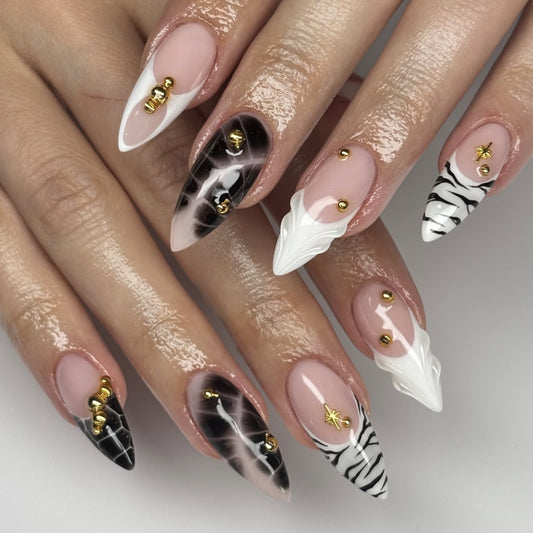Bold Panthera Glamour Spike Press-On Nail Set in Glossy Ombre Long Almond Black and White with Gold Stud Accents