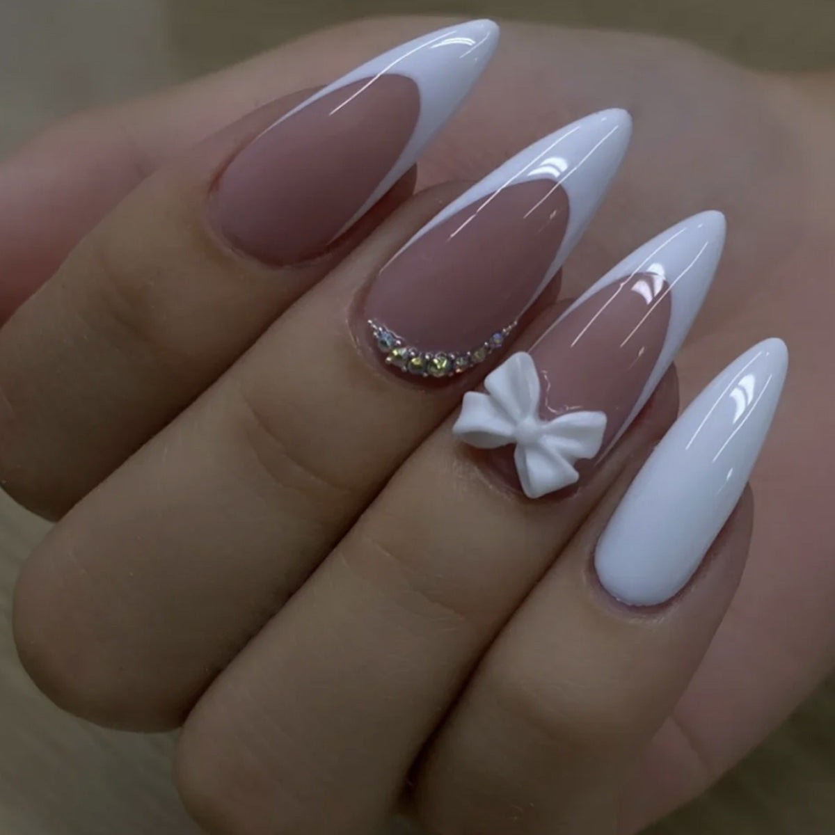 Charming Elegance Long Stiletto Ombre White and Pink Press-On Nail Set with Bow and Sparkling Detail