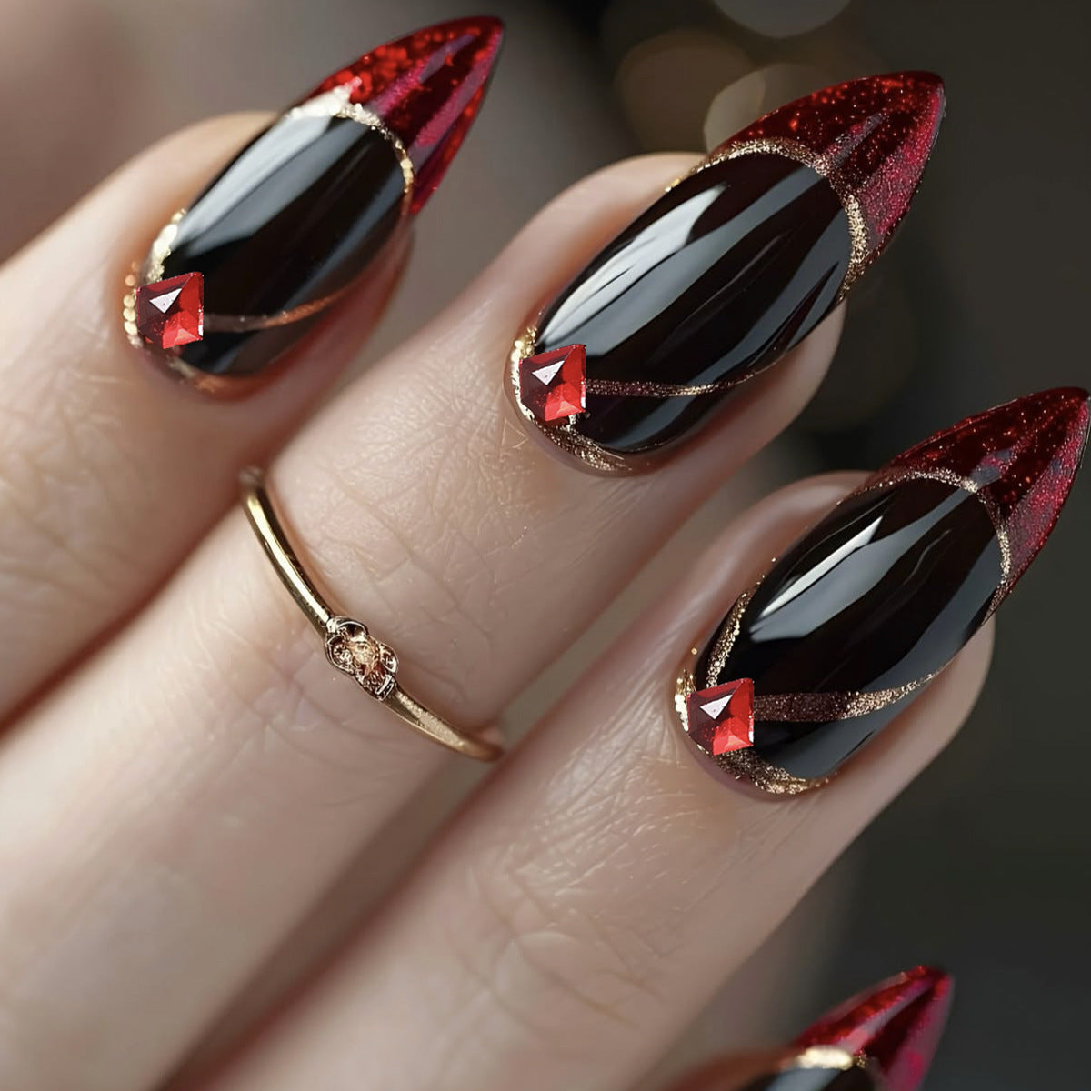 Mystical Elegance Long Stiletto Red and Black Glossy Nails with Sparkling Gem Accents