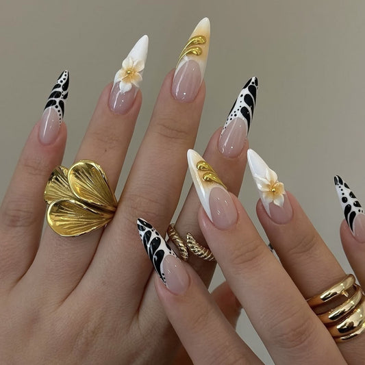 Elegant Garden Medium Stiletto Press On Nail Set in White Black and Natural with Floral and Metallic Accents