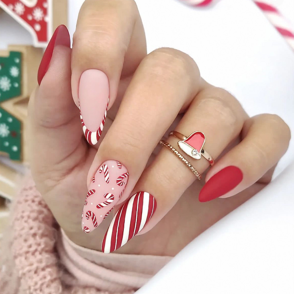 Festive Candy Cane Almond Shape Long Red and Pink Press On Nail Set with Whimsical Holiday Design
