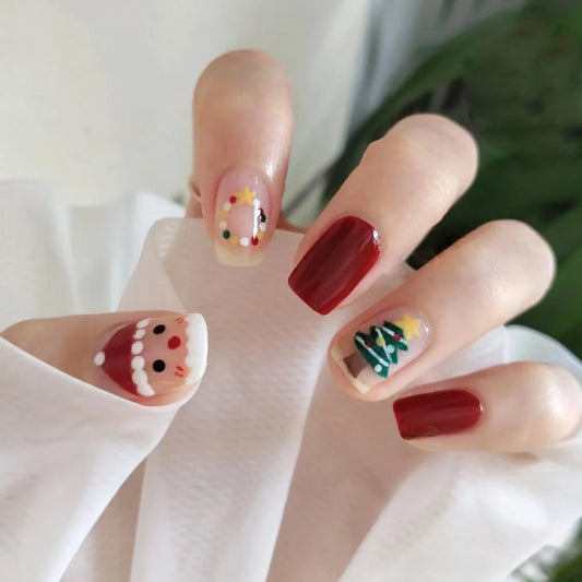 Festive Holiday Cheer Medium Square Red and Clear Press On Nail Set with Cute Santa and Christmas Tree Designs