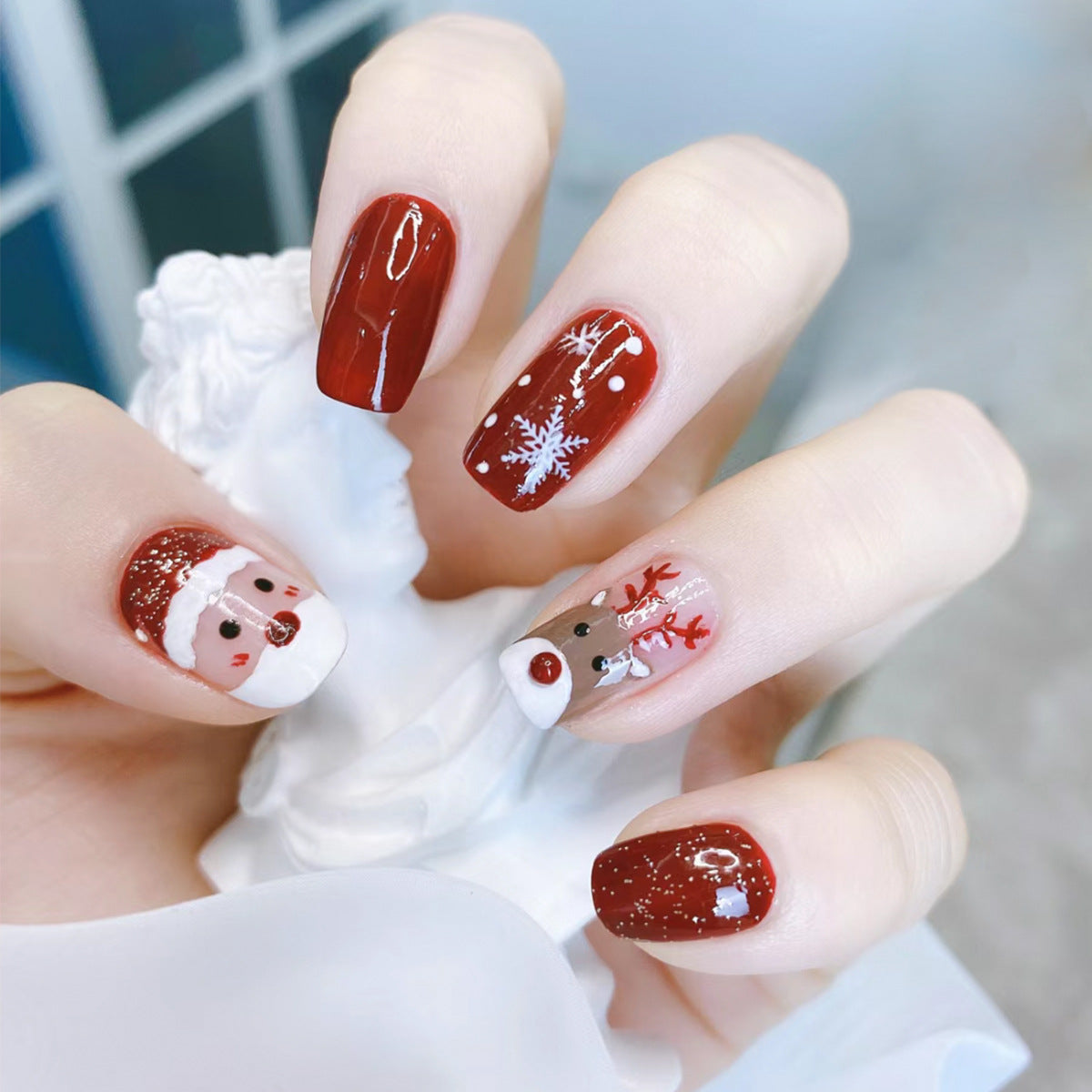 Festive Winter Wonderland Long Square Red Nail Set with Santa and Reindeer Art