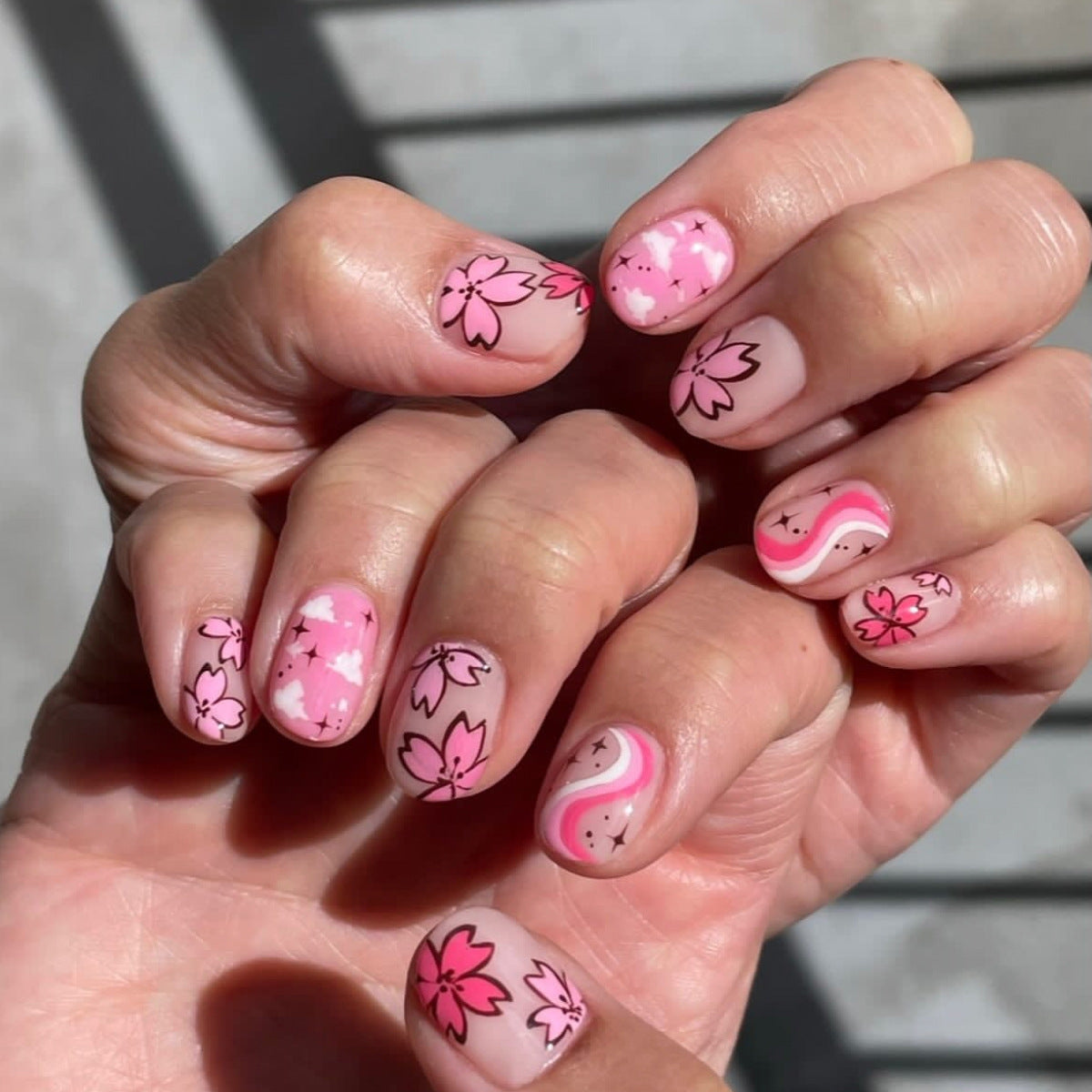 Cherry Blossom Dream Short Round Pink Floral Nail Set with Unique Swirl Design