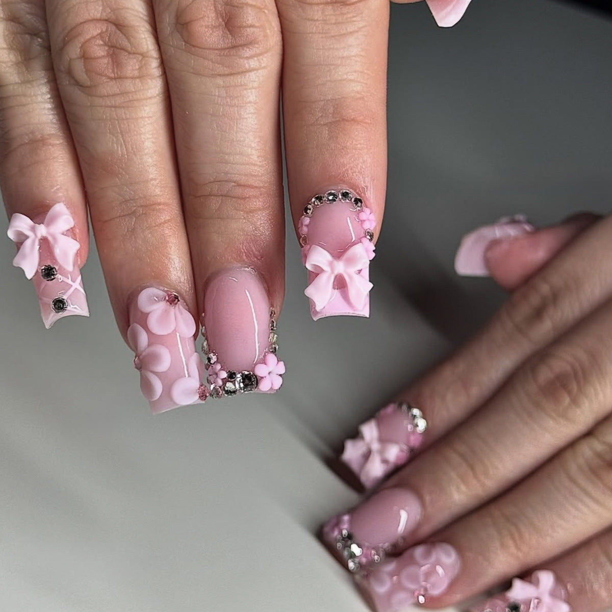 Whimsical Pink Short Square Nails with Floral Embellishments