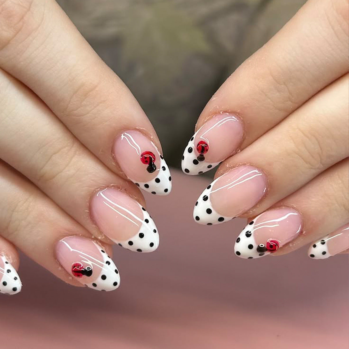 Chic Floral Inspired Medium Almond White and Black Polka Dot Press On Nail Set with Cute Red Accent дизайна