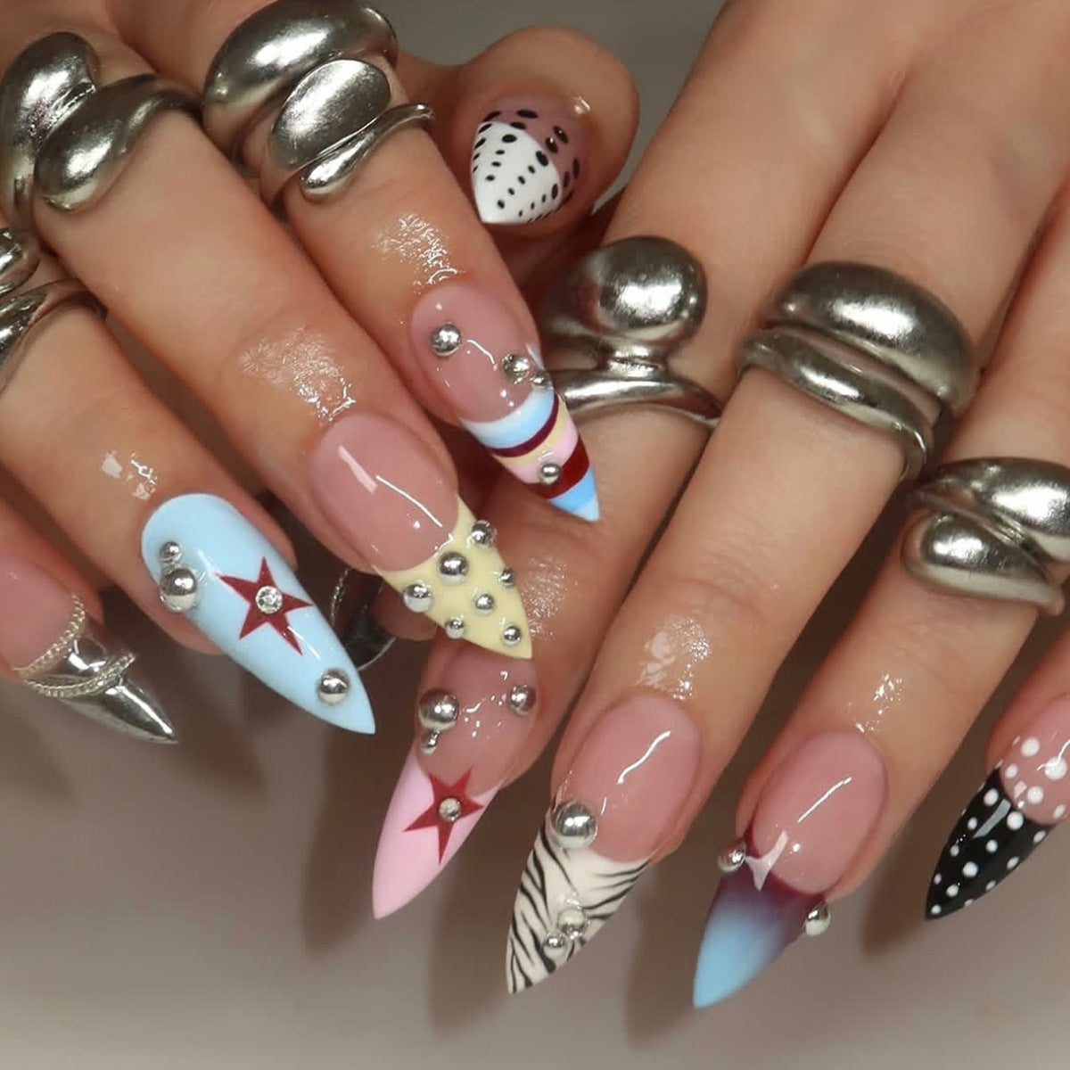 Glamorous Medium Almond Multicolored Nail Set with Unique Gemstone Accents
