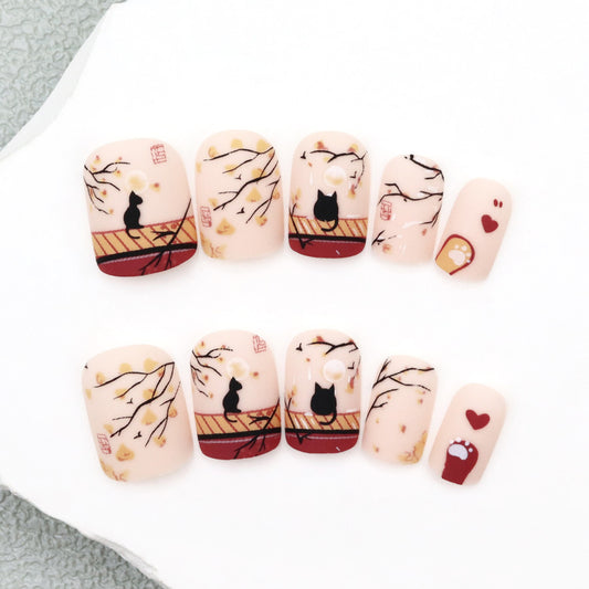 Whimsical Autumn Charm Short Squoval Peach Nail Set with Cat Designs and Leaf Accents