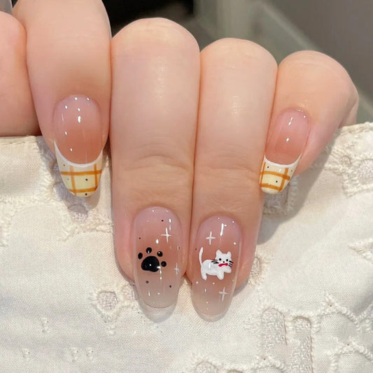Cozy Cat-Themed Long Oval Shaped Clear and White Press On Nail Set with Adorable Kitty and Paw Print Designs