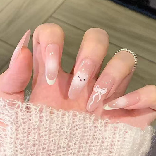 Whimsical Elegance Long Almond Pink Ombre with Adorable Bow Design and Shimmering Glitter Press On Nail Set