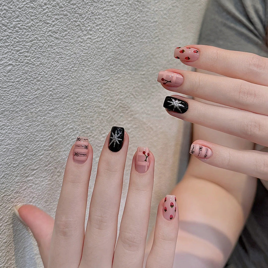 Enchanting Glamour Floral Short Square Press On Nail Set in Medium Length with Vibrant Pink and Black Colors Featuring Unique Glitter Accents