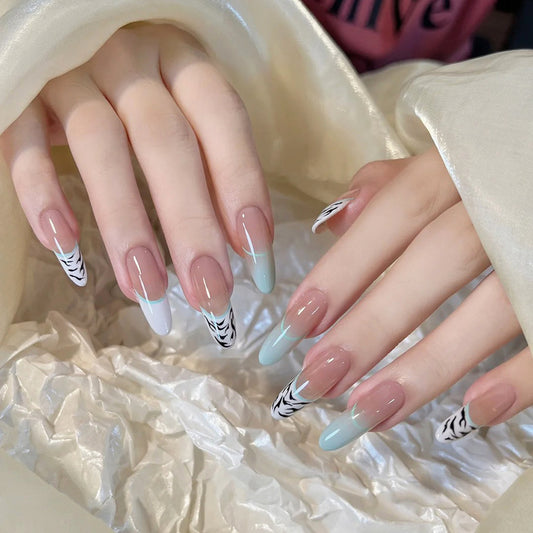 Wild Safari Elegant Oval Long Mint Green and Cream Gradient with Chic Zebra Nail Art Design