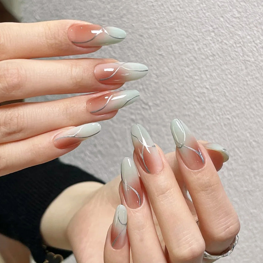 Enchanted Garden Long Almond Shaped Green Gradient Nails with Elegant Swirl Design