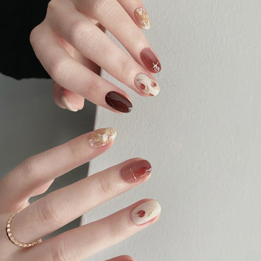 Autumn Elegance Short Oval Burgundy and Beige Marble Nails with Unique Floral Accents