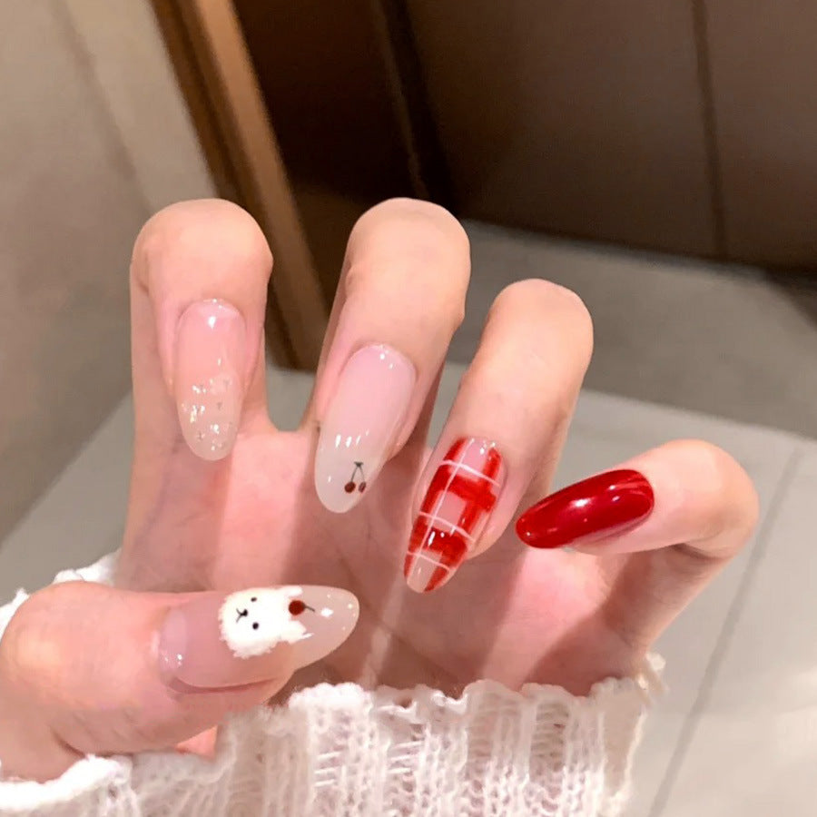 Winter Wonderland Elegant Short Oval-Shaped Red and Clear Press-On Nail Set with Charming Cherry and Polar Bear Designs