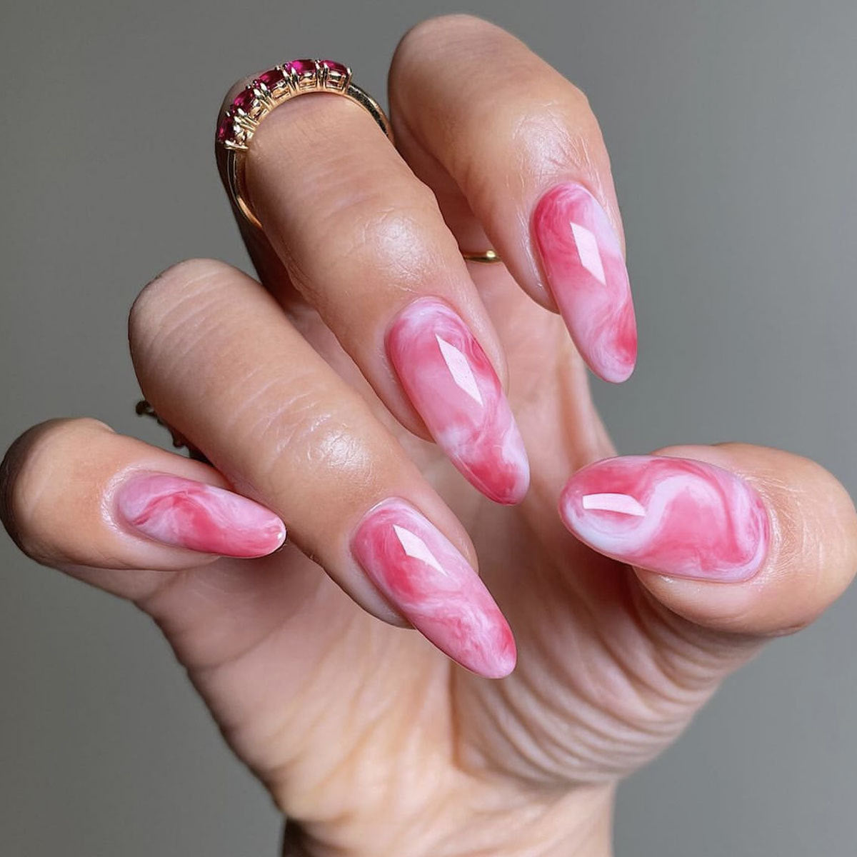 Dreamy Pink Marble Long Almond Shaped Press On Nails with Unique Gemstone Accents