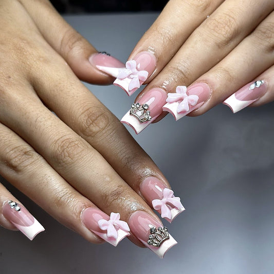 Royal Elegance Long Square Shaped Soft Pink Press On Nail Set Featuring Charming Bow and Crown Accents