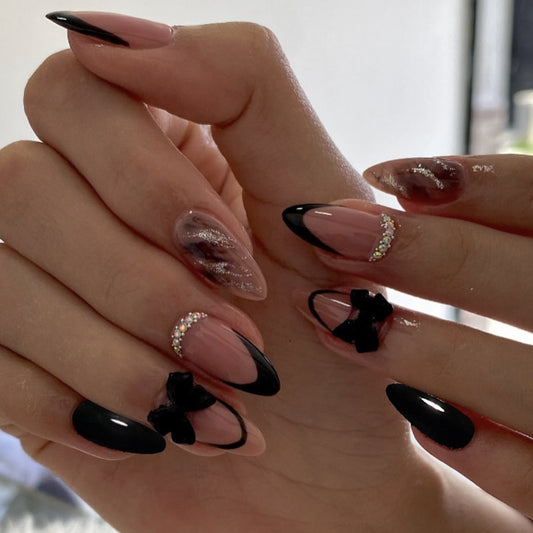 Chic Elegance Medium Almond Blush Pink and Black Press-On Nails with Black Bow and Glitter Accent